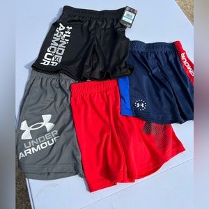 4 pair of under armor shorts size 5